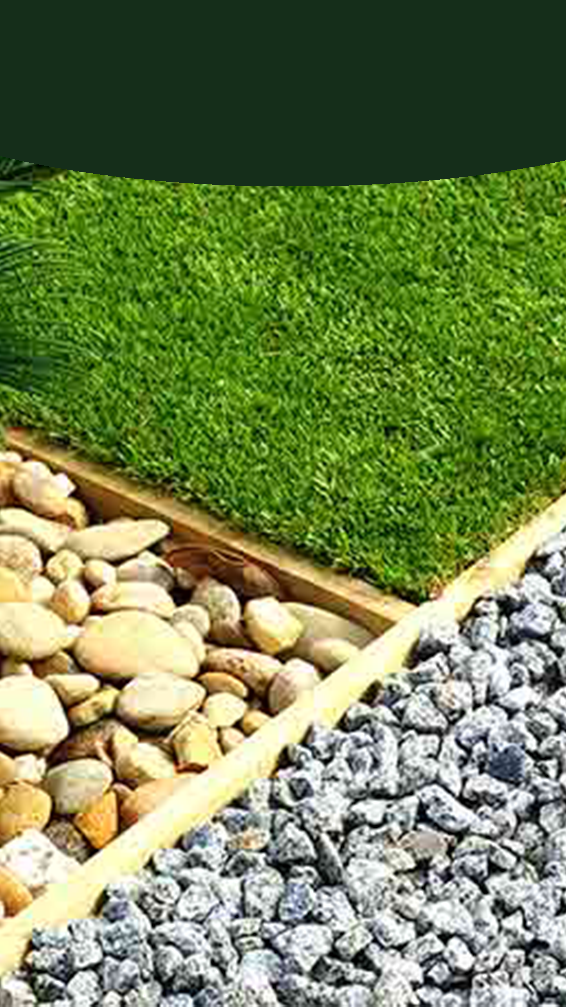 pasto sintético para decoración con piedras decorativas