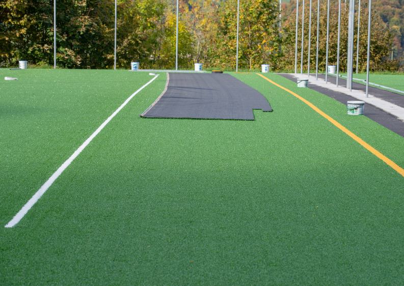 pasto sintético Alfombra en un campo deportivo